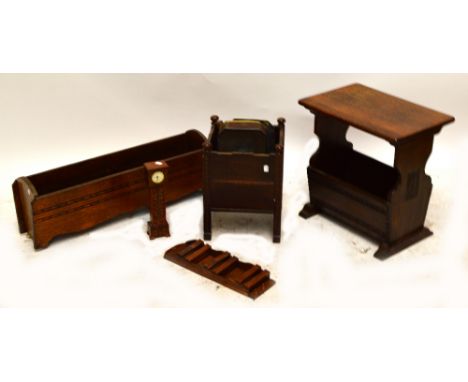 An oak side table/magazine rack, a rectangular oak trough, a square section planter, a miniature carved longcase clock, and a