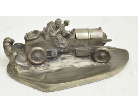 WILHELM ZWICK for KAYSER; a 1930's pewter coloured composition novelty inkwell and pen tray modelled as an early Mercedes Ben