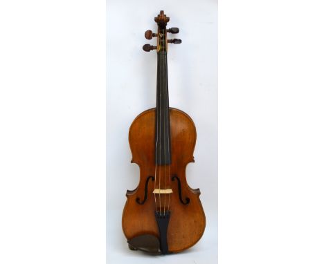 A full sized violin, Stradivarius copy with spurious label, two-piece back, with a bow (af).