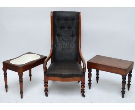 A Victorian mahogany framed high backed elbow chair on ring turned front legs, and two Victorian mahogany bidets (one lacking