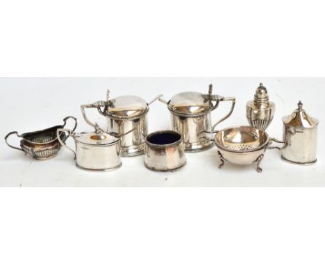 A George V hallmarked silver straight sided oval pepper with matching mustard pot, Walker & Hall, Sheffield 1924, a matched t