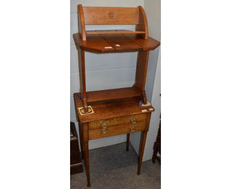 An oak Robson of Newcastle two drawer side table, bearing ivorine label; an oak folding table; and an Arts and Crafts style Y