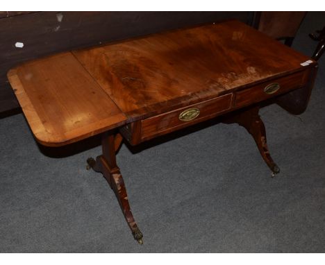 A 19th century crossbanded drop leaf sofa table, fitted with two drawers, 75cm by 92cm (closed) by 58cm deep