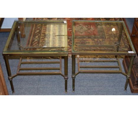 A near pair of mid 20th century, glass topped brass occasional tables, each with reeded legs and shelf stretchers, 46cm by 46
