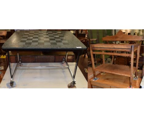 A 1950s oak tea trolley, with concertina top and shelf stretcher, moving on castors; together with a slate and chrome chess t
