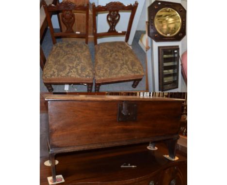 An oak kist composed of period elements, 52cm by 105cm by 38cm; an Oriental style hanging shelf; a pair of Edwardian nursing 