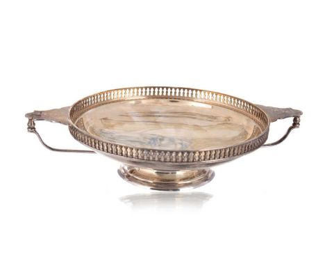 TWO SILVER QUAICHS, SHEFFIELD AND LONDON 1923 the first by Martin, Hall &amp; Co with reticulated gallery, the handles inscri