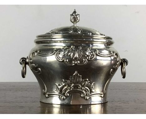 EDWARDIAN SILVER TEA CADDY, HOLLAND, ALDWINCKLE & SLATER, LONDON 1902 of bombe form with twin hoop handles, the hinged cover 