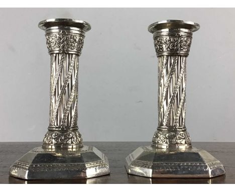 PAIR OF WHITE METAL DWARF CANDLESTICKS, M. RETTIE & SONS, ABERDEEN LATE 19TH / EARLY 20TH CENTURY each fulted column with twi