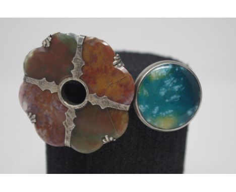 A vintage Minton Hollins Arts and Crafts Astra ceramic pottery brooch pin and a Victorian four section agate Scottish brooch.