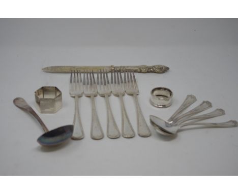 An assortment of silver plate flatware, including a Mappin and Webb ladle, also an Art Deco silver napkin ring and one other