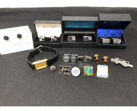 An assortment of boxed and loose cufflinks, pin badges, including a Harley-Davidson; also three watches including a Rotary an