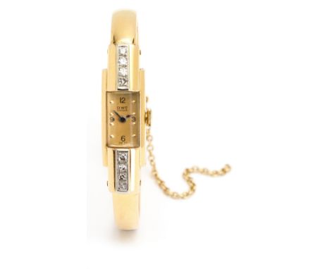 LADY'S DIAMOND WATCH, BRITISH WATCH COMPANY, 1950s the rectangular gold face signed BWC, Suisse with Arabic numerals, faceted