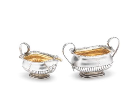 A GEORGE III SILVER SUGAR BOWL AND MILK JUG SET, PAUL STORR FOR RUNDELL, BRIDGE & RUNDELL, LONDON, 1814 oblong, each body and