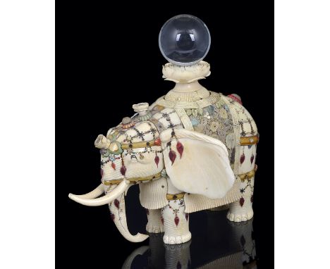 ˜A JAPANESE IVORY 'SHIBAYAMA' WORK FIGURE OF AN ELEPHANT, MEIJI PERIOD (1868-1912) carved standing four-square, inlaid with t