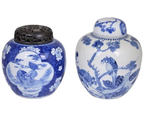 TWO CHINESE BLUE AND WHITE GINGER JARS, LATE 19TH CENTURY one painted with three quatrefoils enclosing a mythical creature in