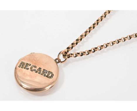 Victorian gilt metal and seed pearl 'Regard' locket pendant on 9ct gold belcher link chain with barrel clasp, 48cm longTotal 