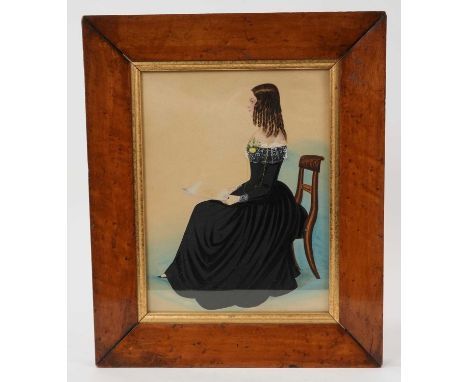 Late Regency watercolour portrait miniature on paper, seated girl reading, 29 x 35cm, in period glazed birds eye maple frame