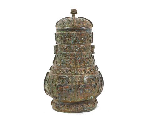 Antique Archaic style Chinese bronze Hu vase and cover, with archaic geometric decoration in relief, six-character mark to ba