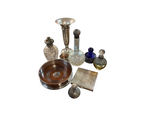 Selection of miscellaneous silver including wine coaster, several perfume bottles, cigarette case, and a napkin ring (various