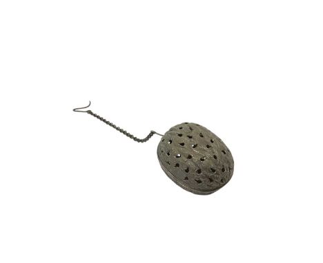 Victorian silver pomander in the form of a walnut, with hinged cover and pierced body (London 1856) John Harris. Together wit