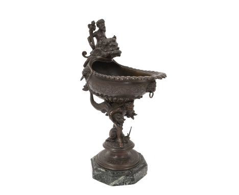 19th century bronze pedestal salt, in the renaissance style, the shell shaped salt raised on figural column and octagonal mar