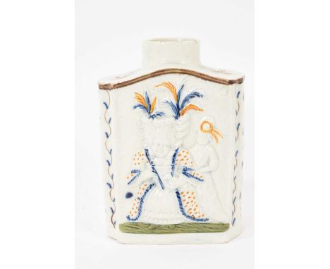 Early 19th century Prattware tea caddy, decorated in relief with Macaroni figures, 11.75cm high