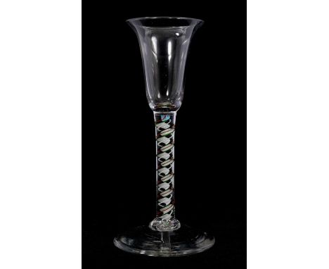 Red and green colour twist wine glass, circa 1765, the bell bowl on a stem containing a multi-ply corkscrew and alternating r