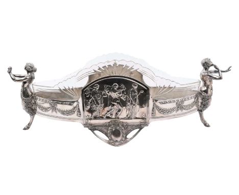 Late 19th/early 20th century WMF table centre of elliptical form, with side panels depicting bacchanalian figures, and handle