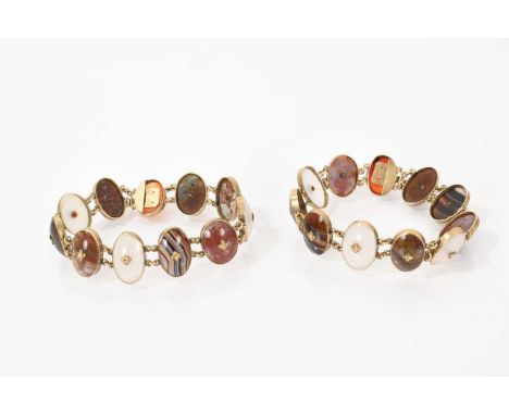 Pair of Scottish pebble bracelets, each with eleven oval agate panels in yellow metal mounts, each 17cm long, can be attached