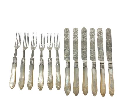 Set of twelve Victorian silver fruit knives and forks, with engraved decoration and carved mother of pearl handles (London 18