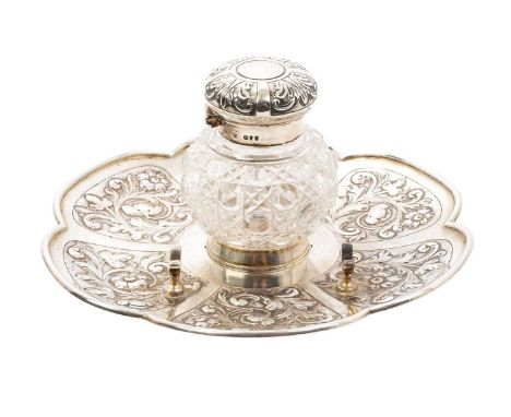 Victorian silver inkstand of hexagonal form, with embossed foliate decoration and central inkwell frame and pen rest, silver 