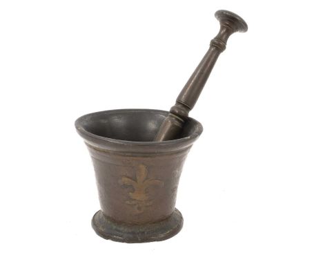 17th century bronze pestle and mortar, with fleur de lys ornament, the mortar 11cm high 