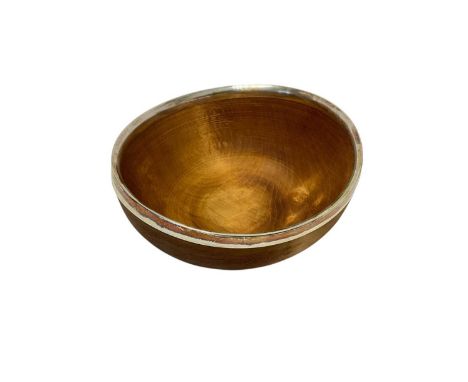 Contemporary wooden mazer bowl, with applied silver rim (Sheffield 2012) maker OW. 13.5cm diameter.