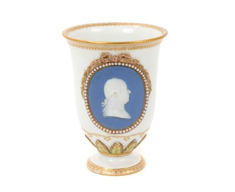 Meissen tall cup, circa 1780, with relief moulded bisque portrait profile, marked to base, 10.25cm high