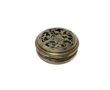 Early George V silver pot pourri bowl of circular form, with pierced slip on cover, with floral bouquet decoration (London 19