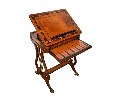 William IV rosewood and coromandel crossbanded lyre games table, with adjustable book rest top and side drawer, leather inset
