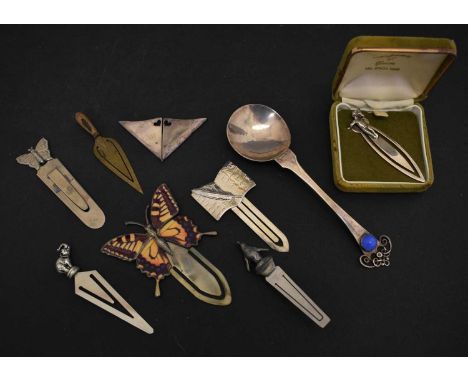 Collection of assorted book marks, to include a white metal example with cherub terminal, plus base metal elephant, penguin, 