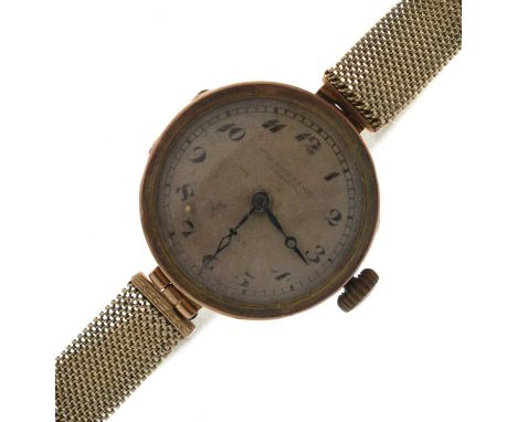 Early 20th century lady's 9ct gold bracelet watch, the silvered guilloche dial Arabic hour markers and blued steel hands, man