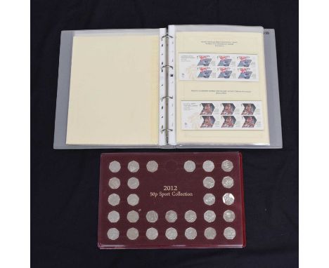 London 2012 Olympics - Collection of twenty-nine 50p pieces, together with an album of Royal Mail mint 1st class stamps