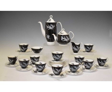 Royal Albert 'Night &amp; Day' pattern twelve person part service comprising; cups and saucers, teapot, coffee pot, side plat