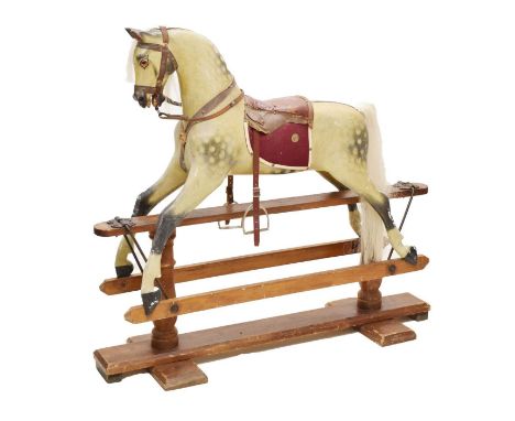 Attributed to Ayres - Children's painted wooden rocking horse, with carved nose and mouth detail, leather saddle, horse-hair 