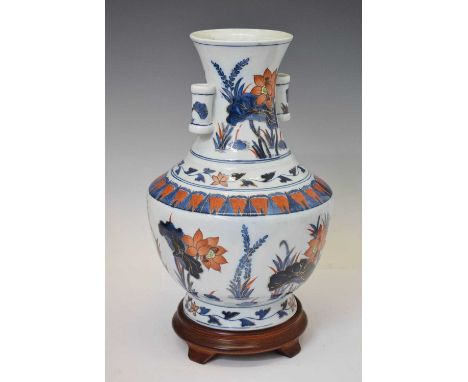 Japanese Imari 'Arrow vase' in the Chinese taste, 34cm high, with hardwood stand