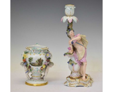 Meissen - Late 19th / early 20th century porcelain figural candlestick of a classical gentleman with grapes and goblet restin