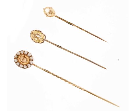 Imperial topaz and pearl stick pin, and two other similar pins, 8,3g gross approx (3)