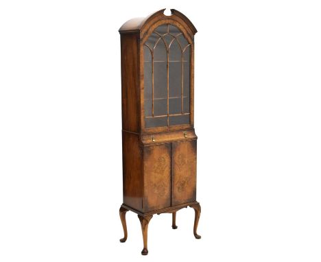 1920s Queen Anne style burr walnut display cabinet, the single glazed door section fitted with two shelves, over single long 