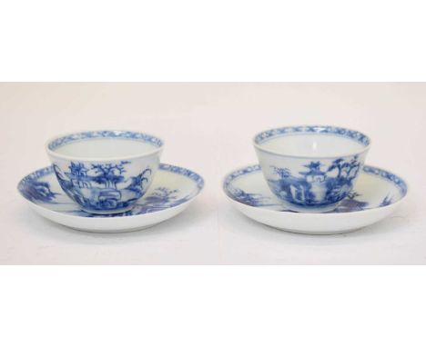 Nanking Cargo - Two small tea bowls, together with two saucers, all with landscape decoration, three bearing Christie's 'The 