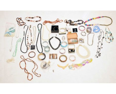 Quantity of costume jewellery to include beaded necklaces, Sterling silver and other bracelets, fashion beads, floral brooche