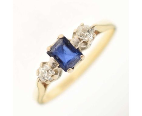 18ct gold sapphire and diamond three-stone ring, the step cut sapphire between two old cut diamonds, size M½ approx, 2.7g gro