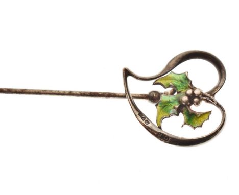 Charles Horner silver and enamel hat pin, the open-work heart motif with green enamel holly leaves, Chester 1907, 21.5cm long